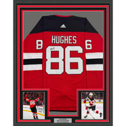 Framed Autographed Jack Hughes 35x39 New Jersey Devils Authentic Red Hockey Jersey